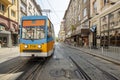 Photographing trams in the middle of the road in the center of city