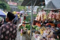 Photographs of sellers on the side of the road, jars. for souvenirs with various kinds of food being sold, such as fruit, sweets,