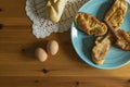 Photography from above of a typical Spanish dessert eaten during easter. Morning shot.Cinnamon,eggs and bread