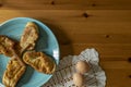 Photography from above of a typical Spanish dessert eaten during easter. Morning shot.Cinnamon,eggs. Wooden background