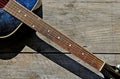 Photography of acoustic guitar neck