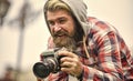 Photography business. Old technology. Bearded man hipster take photo. Brutal stylish man with retro camera. Modern Royalty Free Stock Photo