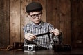 Photography, child and vintage with camera film, thinking and mockup in glasses by backdrop. Boy, idea and nerd with Royalty Free Stock Photo