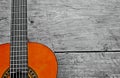 Photography of classical guitar neck over wooden background Royalty Free Stock Photo