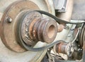 a photography of a close up of a machine with a hose, there is a close up of a rusted metal object on a train Royalty Free Stock Photo