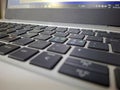 Photography close up shot of used laptop computer or notebook keyboard keys Royalty Free Stock Photo