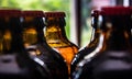 Photography of cones of beer bottles with airtight caps, beer is one of the oldest and currently drunk beverages in the world