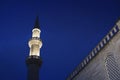 Detail of minaret of Suleymaniye mosque in Istanbul (Turkey) at night with dark blue sky in the background Royalty Free Stock Photo