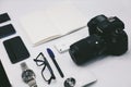 Photography equipment over white table background