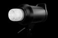 Photography high speed studio flash lamp isolated on black background Royalty Free Stock Photo