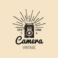 Photography logo. Vector vintage old camera label, badge, emblem. Hand sketched illustration for studio, store etc. Royalty Free Stock Photo