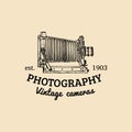 Photography logo. Vector vintage old camera label, badge, emblem. Hand sketched illustration for studio, store etc. Royalty Free Stock Photo