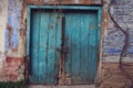 Old, colorful wooden door with lock - fairytale door to a world of fantasy Royalty Free Stock Photo