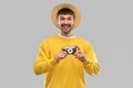 Happy man in straw hat with vintage film camera Royalty Free Stock Photo