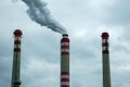 Smoking chimneys of coal power plant - air pollution - dark sky - global warming Royalty Free Stock Photo