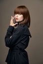 Close-up charming woman Light skin suit outerwear