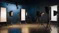 Photography studio setup for a creative project under soft lighting with multiple equipment and backdrops Royalty Free Stock Photo