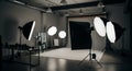 Photography studio setup with various lighting equipment and camera lenses on a table softbox Royalty Free Stock Photo