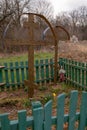 Photography to theme old grave with cross during Ukraine war