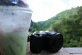 photography traveler and landscape view scene on high mountain in green forest .