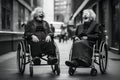 photography of two elderly ladies laughing, in wheelchairs and having a good time as if they were little girls in town Royalty Free Stock Photo