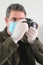Photojournalist photographing the Coronaviruse pandemic COVID-19 outbreak