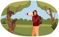 Photojournalist with camera takes pictures of animals in their natural habitat in forest or jungle Royalty Free Stock Photo