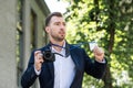 photojournalist in formal wear with digital photo camera and press Royalty Free Stock Photo