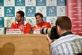 Photojournalist photographing tennis press conference