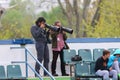 Photojournalists shooting the Tennis Match Between Daniel GIMENO-TRAVER and Viktor TROICKI
