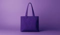 A photorealistic and bold violet tote bag isolated on a muted purple Royalty Free Stock Photo