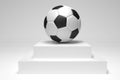 Photorealistic 3D rendering of a football in the studio Royalty Free Stock Photo