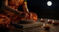 Devotion in Sandalwood A Dancers Henna Hands Grinding Paste at Night Royalty Free Stock Photo