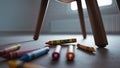 Photorealistic image of a broken crayon on wooden desk Royalty Free Stock Photo
