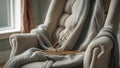 Photorealistic image of a knitting needles on cozy chair Royalty Free Stock Photo