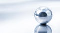 Photorealistic image of a minimalistic metal sphere on a clean surface, capturing light reflections and subtle shadows Royalty Free Stock Photo