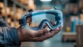 Photorealistic image of a safety goggles in a construction site Royalty Free Stock Photo