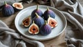 Photorealistic image of a white plate with figs Royalty Free Stock Photo