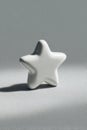 Photorealistic White Ceramic Star on Light Grey Background Royalty Free Stock Photo