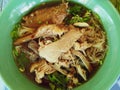 Photos above Braised Duck Noodle Street food in Thailand Consisting of small white lines Stewed duck meat and vegetables. Royalty Free Stock Photo