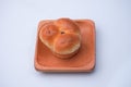 Market snack bread filled with jam on a white background