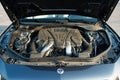 Photos of the Mercedes Benz SL550 convertible on the road. View of the car engine Royalty Free Stock Photo