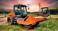 Heavy construction vehicles of a Single Drum and Sheepsfoot Roller. Royalty Free Stock Photo