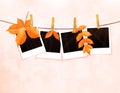 Photos on rope with clothespins and autumn leaves vector