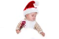 Photos of smiling young baby in a Santa Claus hat Royalty Free Stock Photo