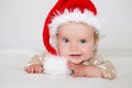 Photos of smiling young baby in a Santa Claus hat Royalty Free Stock Photo