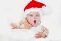 Photos of smiling young baby in a Santa Claus hat Royalty Free Stock Photo