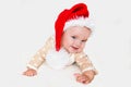 Photos of smiling young baby in a Santa Claus hat Royalty Free Stock Photo