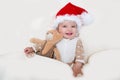 Photos of smiling young baby in a Santa Claus hat Royalty Free Stock Photo