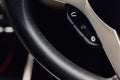 Photos of sterring wheel with bluetooth and phone calling control buttons. Royalty Free Stock Photo